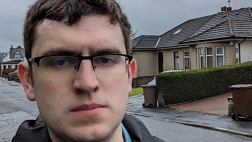 Grant Toghill with houses in the background.