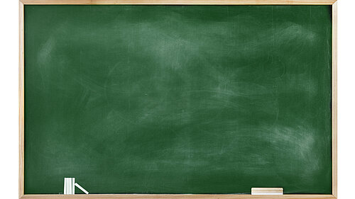 A chalkboard, chalk and a rubber.