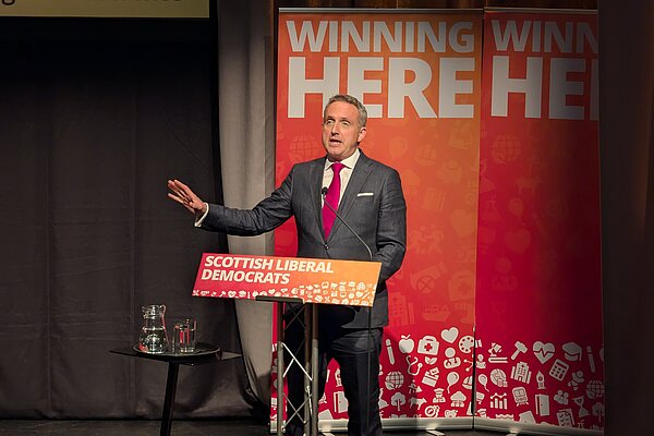 Alex Cole-Hamilton MSP speaking at Scottish Liberal Democrat conference.